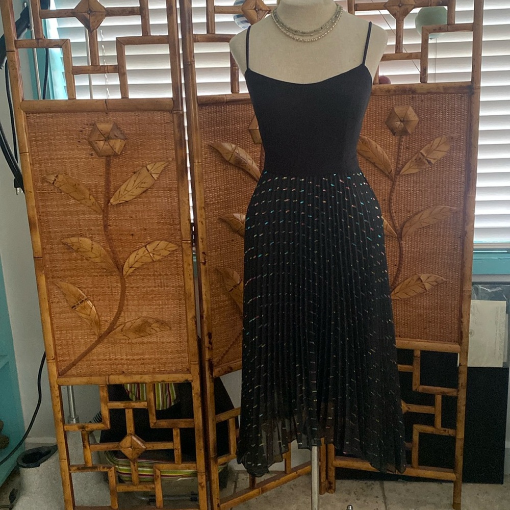 Aqua cocktail dress with spaghetti strap top with back zipper. Size 0.#3132